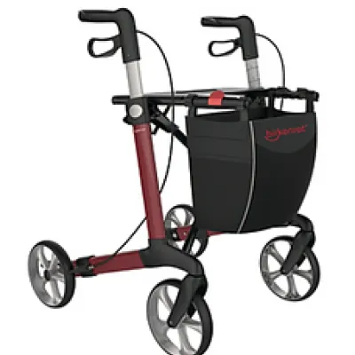Rollator Router mit rotem Rahmen, schwarzer Einkaufstasche und vier Rädern für den Aussenbereich