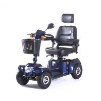Vierrädriger Elektro-Scooter Bility S in dunklem Blau mit schwarzem Sitz, Kopfstütze und Korb